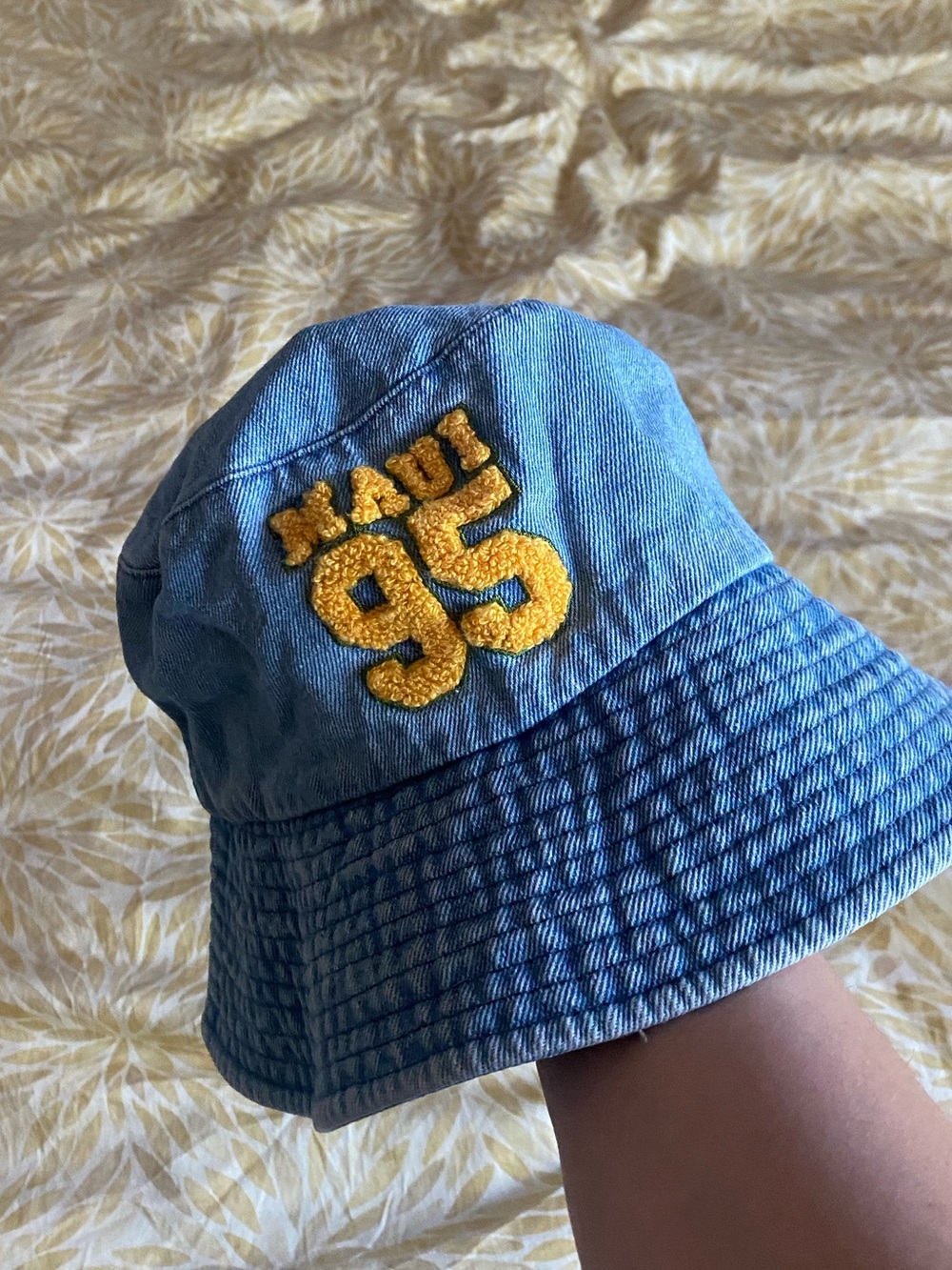 💥donating 9/1💥 
Denim Bucket Hat with Yellow 'Maui 95' Chenille Patch